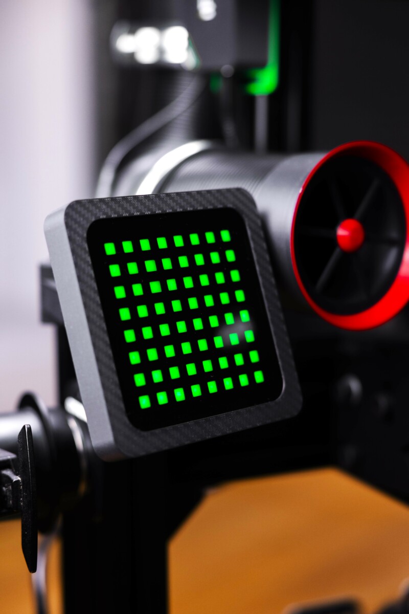 OCRacing iFlag LED flag indicator installed on a sim racing cockpit